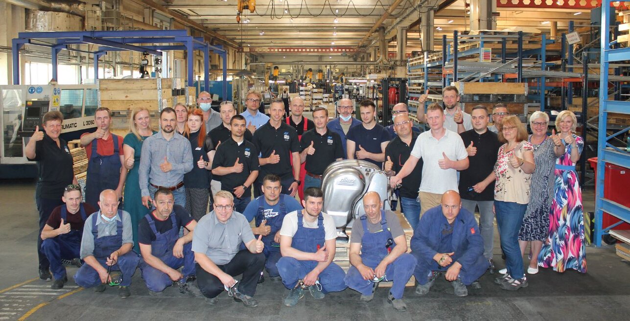 A proud production and development team in Dinex Latvia.