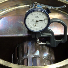 Quality inspection with a pressure gauge